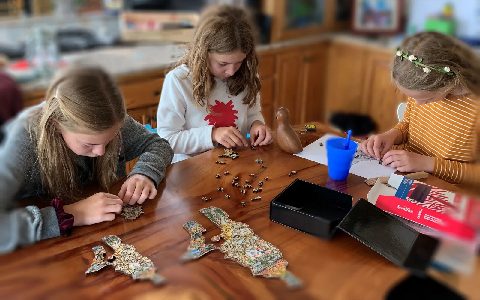 Friends testing puzzle prototypes